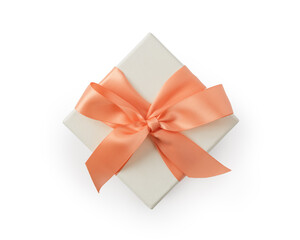 Top view of white paper present box with orange ribbon isolated on white background