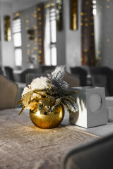Elements of Christmas decor indoors. Beautiful Christmas decorations. New Year's interior concept