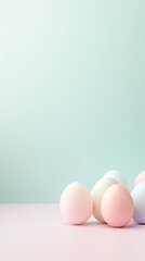 Fototapeta premium A serene Easter setting with a soft pastel gradient background, adorned with a collection of delicately colored eggs