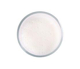 Glass of tasty milk isolated on white, top view
