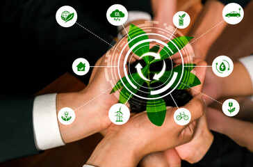 Business partnership nurturing or growing plant together with recycle icon symbolize ESG...