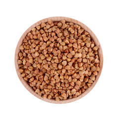 Dry buckwheat in wooden bowl isolated on white, top view