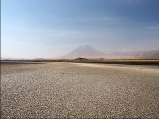 Filed of a dried mud at the foot of Oldonyo Len’gai volcano near Lake Natron in Tanzania