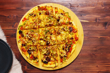 Homemade St. Louis Style Pepperoni Pizza. The tavern cut, close up