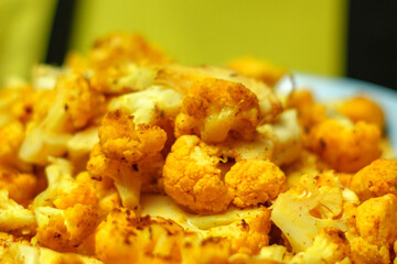 Steak of baked cauliflower with herbs. Healthy eating. Selective focus