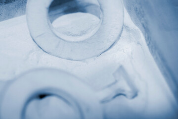 Objects printed on a 3D printer from powdered polyamide lying in white polyamide powder. Models printed on a 3D printer from powdered plastic close-up. MJF Multi Jet Fusion. 3D printing technology