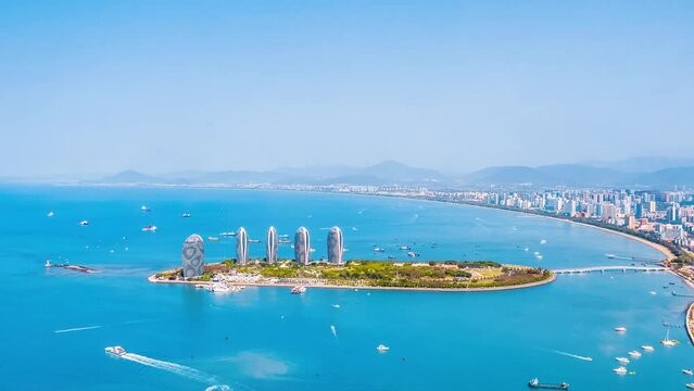 Time lapse photography of urban scenery surrounding Phoenix Island in Sanya, Hainan, China