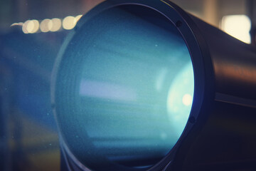 Close up of a lighting lens with flare and bokeh