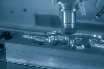 The CNC milling machine cutting  forging mold part by solid ball end mill tool.