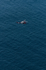 Helicopter in the sea - obrazy, fototapety, plakaty