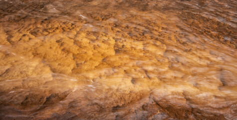 Orange Rock Below Rushing Water Of Sulfur Creek