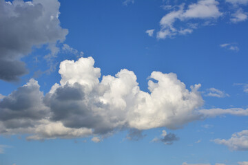 white and dark cumulus clouds in the sky wallpaper copy space