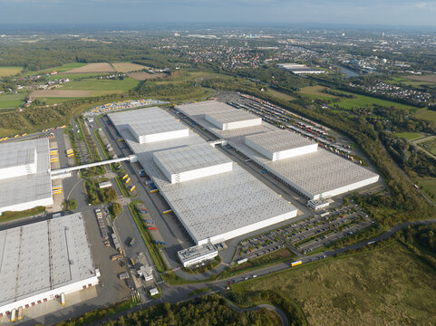 Aerial Drone View On A Large Distribution Center, Product Warehouse And Shipping.