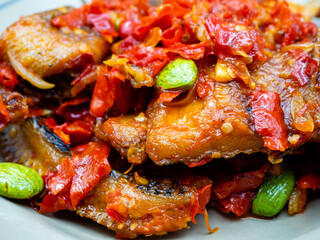 Fried salted snakehead fish with balado and petai sauce.