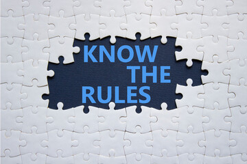 Know the rules symbol. Concept words Know the rules on white puzzle. Beautiful deep blue...