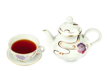 Porcelain teapot and a cup of tea isolated on a white. Collage. Vintage china.