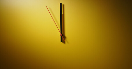 Modern clock hands showing time under dramatic light on a yellow background.
