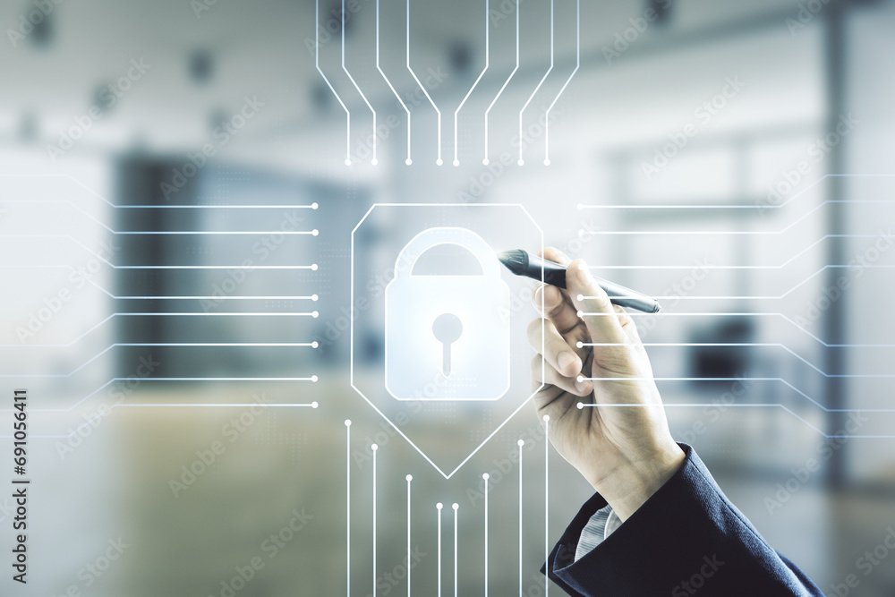 Poster man hand with pen draws virtual creative lock symbol and microcircuit illustration on blurred office