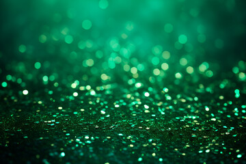 Glittery background with emerald green sparkles. Background for holiday party invitations or greeting cards, decorative prints. Banner with space for text. Holiday concept.