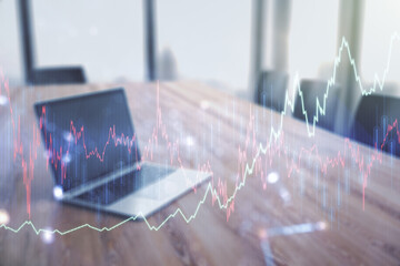 Double exposure of abstract creative financial diagram on modern laptop background, banking and accounting concept