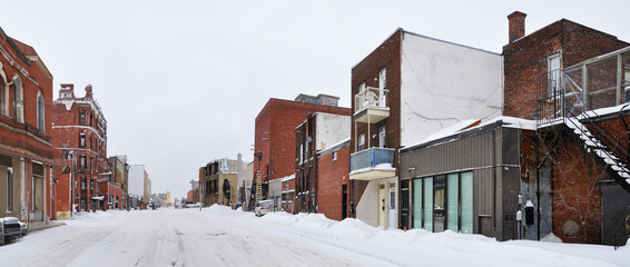 Panoramic view of a street in winter in an old neighborhood of Montreal 