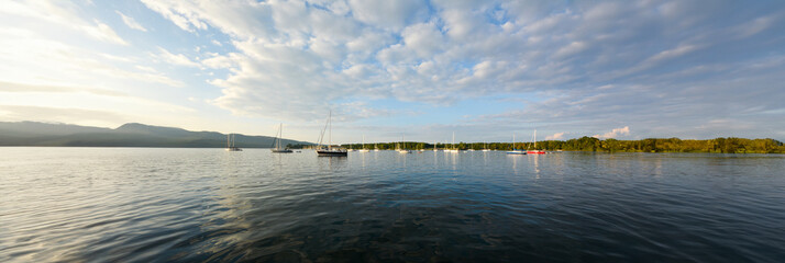 Panoramic view of sailboats at anchor in a bay of Lake Champlain