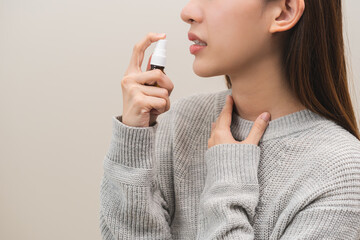Health care treatment sore throat concept, sick pain asian young woman have cough symptom holding...