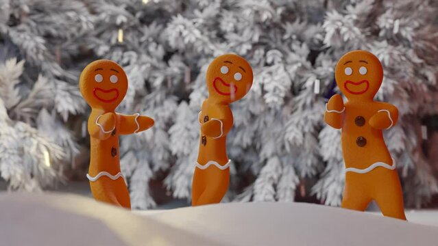 Cute gingerbread cookies dancing in the snow