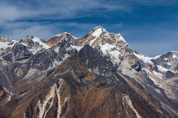 Beautiful HImalayan Mountain Range with Snowy Peaks and Blue Sky in Nepal's Trekking Route