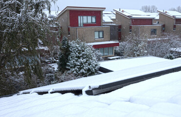 Closeup of photovoltaic solar panels covered by snow