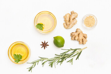 Ginger, rosemary sprig, tea and lime. Treatment of colds and flu