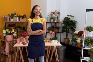 Young african american woman florist smiling confident standing with arms crossed gesture at flower shop