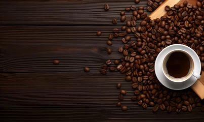 Tuinposter the background of a cup of coffee seen from above on a wooden base © Red Rubah