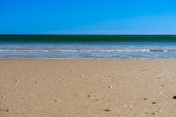 View of idyllic nature landscape with huge beaches and waves crashing on. Manta Rota beach. West Atlantic coast of Algarve region, south of Portugal.
