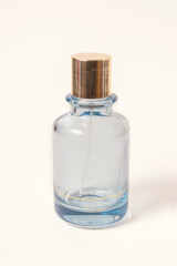 blue perfume bottle isolated on white background