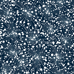 Seamless geometric pattern with sparkling white fireworks on a blue background. Abstract starry sky with an explosion of small circles. Dotty texture. Modern style design. Vector illustration.