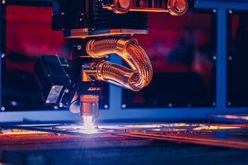 Metallurgy milling plasma cutting of metal CNC Laser engraving. Concept background modern industrial technology, blue toning - obrazy, fototapety, plakaty
