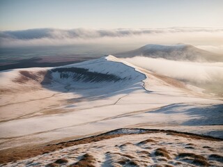 Aerial view of Pen-y-Fan in the Brecon Beacons with a light dusting of snow