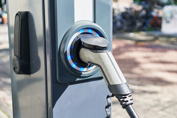 Electric car charging at street