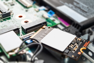 modern ssd drive in a laptop, replacement repair, close
