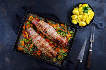 Roasted Mangalica pork tenderloin stuffed with chopped walnuts and pumpkin and wrapped in bacon...
