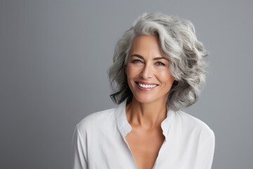 Fototapeta premium woman with grey hair smiling