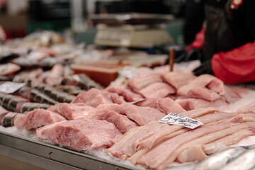 A Variety of Fresh Meats Displayed on a Table at Obor Fisher Market