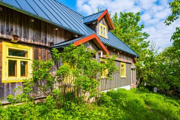 Old typical wooden house in Kojle village , Suwalki Landscape Park, Podlasie, Poland