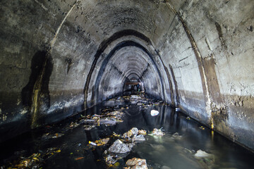 Underground urban sewer tunnel. Large sewage collector