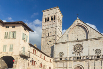 View of Cathedral of San Rufino with blue sky in the background. in italian Assisi. Umbria. Horizontally. 