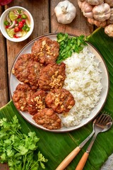 Rice topped with  fried minced pork and garlic, thai food, top view food table , home cooked, street food,