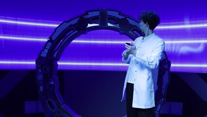 Portrait of caucasian man in white uniform experiencing failure when launching new equipment. Young professional switching off the system. High quality 4k footage