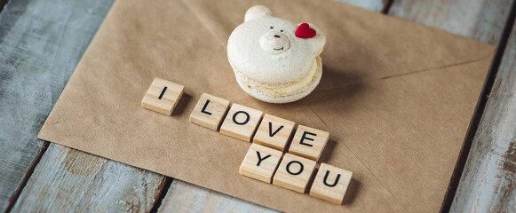 Simple romantic surprise for a Saint Valentine's Day morning. Wooden letter with phrase I love you...