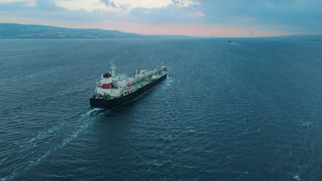 Crude Oil tanker carrier ship underway through Dardanelles Strait, aerial view, concept worldwide logistic and global trade
